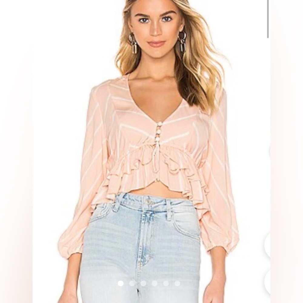 Free People Samifran Tie Front Ruffle Blouse
Size medium